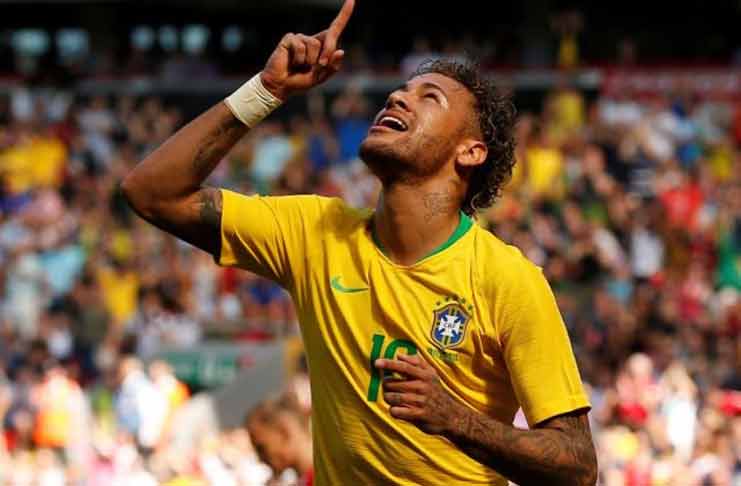 Brazil's Neymar celebrates scoring their first goal REUTERS/Andrew Yates