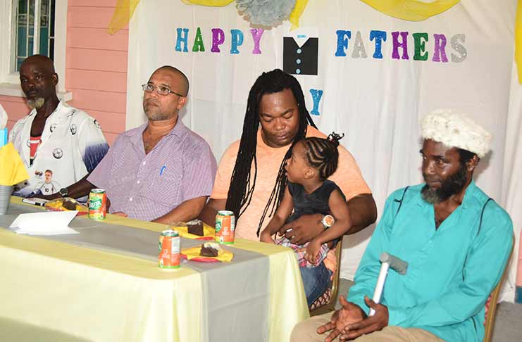 The honoured fathers, from left,Terrence McAllister, Clinton Chin, Odinga Caldeira and Azam Hunte. (Adrian Narine photo)