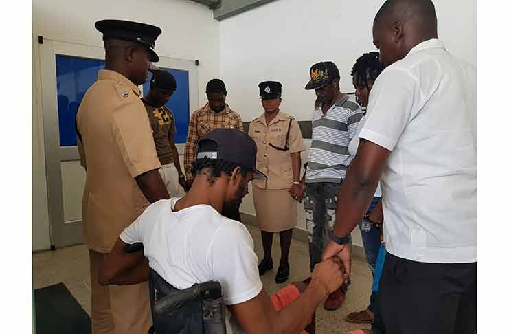 Members of the Guyana Police Force, led by Deputy Commander Wayne DeHearte prayed with the family of Beyonce Ross, a National cyclist who is diagnosed with a brain tumour.