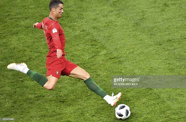Portugal's forward Cristiano Ronaldo kicks the ball during the Russia 2018 World Cup Group B football match between Iran and Portugal at the Mordovia Arena in Saransk on June 25, 2018 (Photo by Mladen ANTONOV/ AFP)
