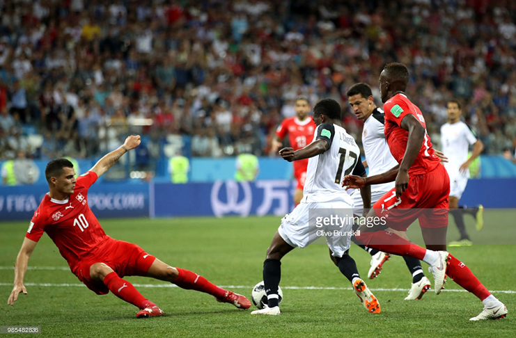 Granit Xhaka of Switzerland tackles Joel Campbell of Costa Rica during the 2018 FIFA World Cup Russia group E match between Switzerland and Costa Rica at Nizhny Novgorod Stadium on June 27, 2018 in Nizhny Novgorod, Russia. (Photo by Clive Brunskill/Getty Images)