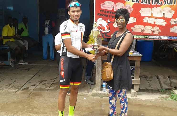 Paul DeNobrega receiving his trophy from Joan Rose, wife of the late Albert Rose.