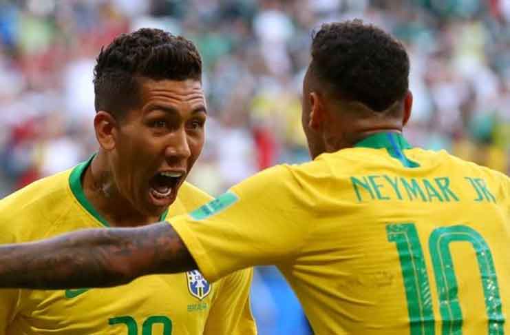 Brazil's Roberto Firmino celebrates scoring their second goal with Neymar REUTERS/Michael Dalder/File Photo
