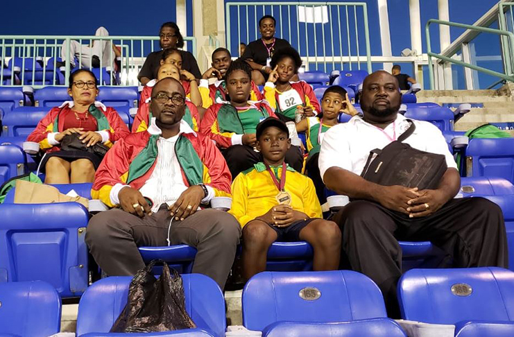The Guyana team with manager, Ceon Bristol, (right) and Guyana Teachers Union President, Mark Lyte (front row, left)