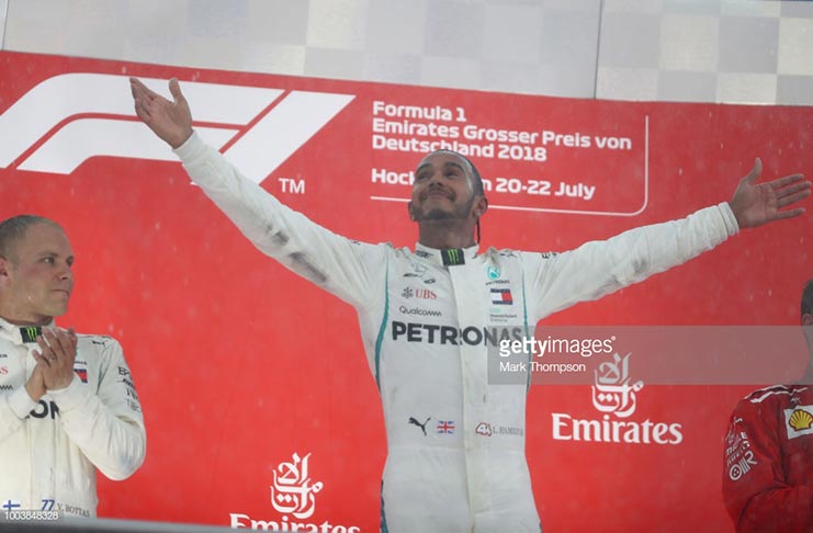 Race winner Lewis Hamilton of Great Britain and Mercedes GP celebrates on the podium during the Formula One Grand Prix of Germany at Hockenheimring on July 22, 2018 in Hockenheim, Germany. (Photo by Mark Thompson/Getty Images)