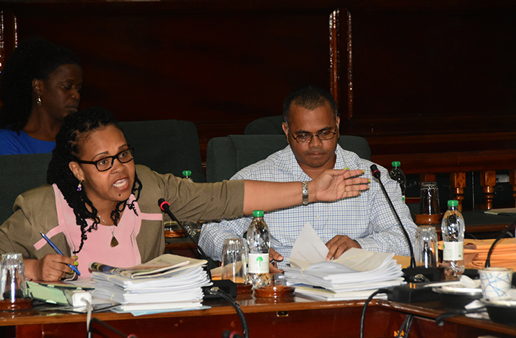 REO of Region Four, Pauline Lucas gesticulates during her response to questions from the PAC (Adrian Narine photo)