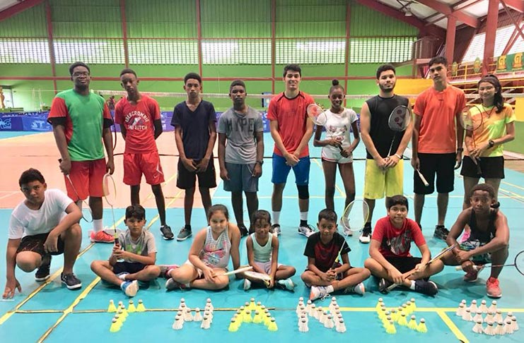 Narayan Ramdhani poses with some of the participants of the recently concluded Badminton Camp.