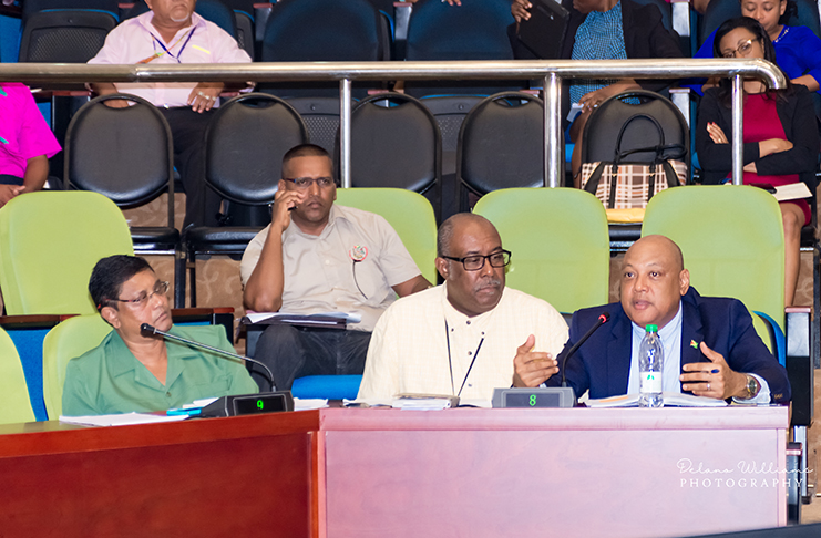 At Tuesday’s meeting between key government officials and toshaos at the Arthur Chung Convention Centre. Seated from left are: GFC’s Commissioner James Singh; GGMC’s Commissioner Newell Dennison; and Natural Resources Minister Raphael Trotman