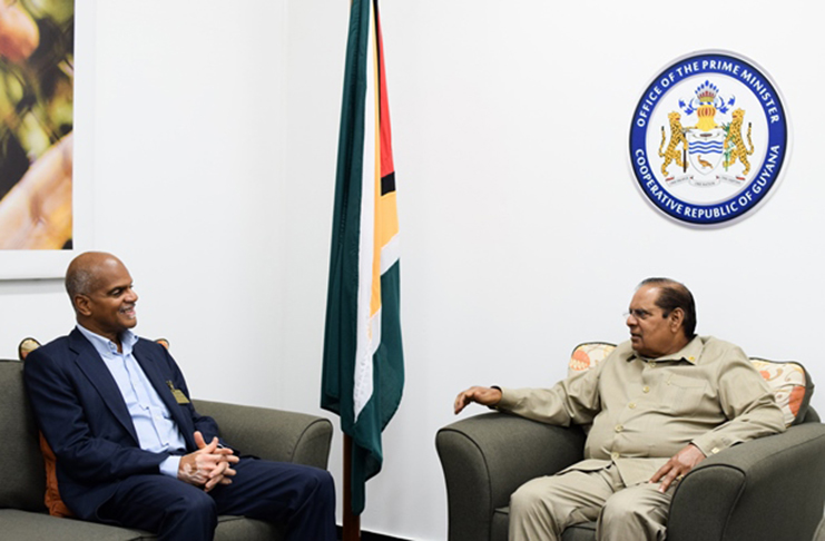 Prime Minister Moses Nagamootoo and Guyana’s High Commissioner to India Dr. David Pollard, in discussion (DPI photo)