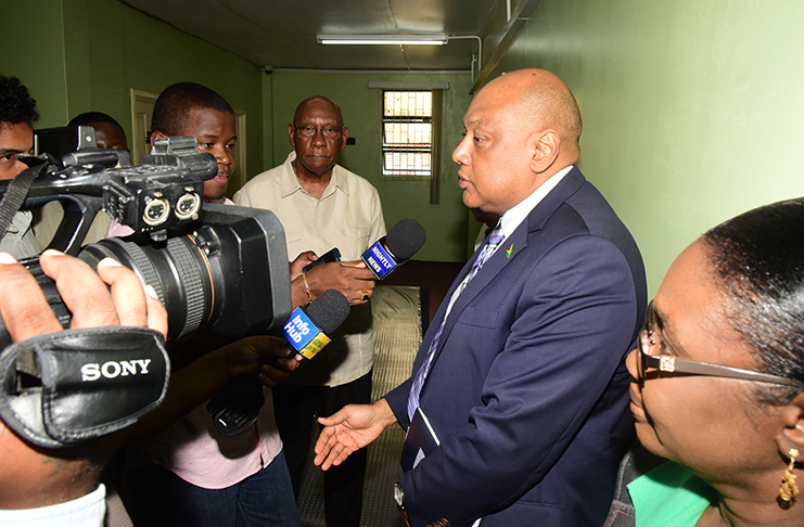 Minister of Natural Resources Raphael Trotman, speaking with the press