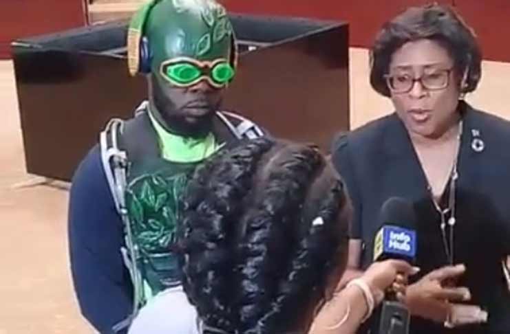 Minister of Public Telecommunications, Catherine Hughes and Trinidad Super-hero ”Agri-man”, Guyanese-born George Caesar, during an interview at the Arthur Chung Conference Centre during the roadshow.