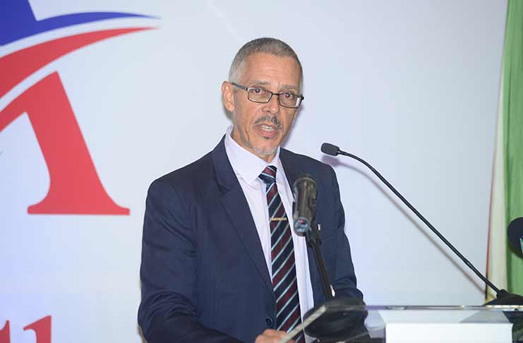 Minister of Business Dominic Gaskin, addressing the gathering on Monday evening (Delano Williams photo)