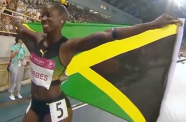 Shashalee Forbes wins gold for Jamaica in the 200 metres at the CAC Games.