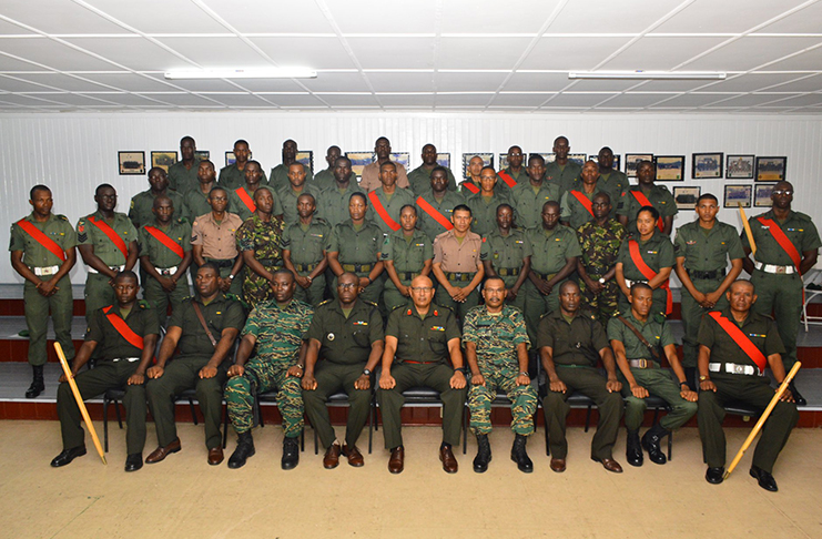 Inspector General, Col. Nazrul Hussain and other officers pose with the graduates of the course