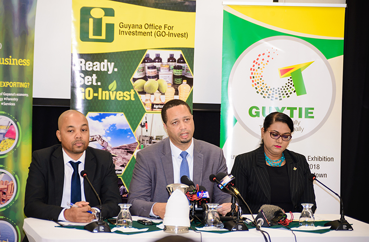 Spearheading the GO-Invest press conference on Thursday are, from left, Public Relations Consultant Christopher Chapwanya; CEO Owen Verwey, and GUYtie Coordinator, Tameca Sukhdeo-Singh