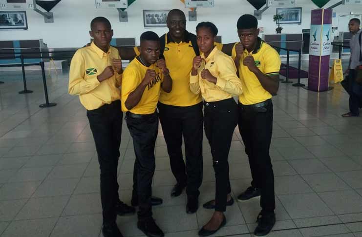 The Jamaica boxing team at the Norman Manley International Airport yesterday afternoon bound for Guyana.