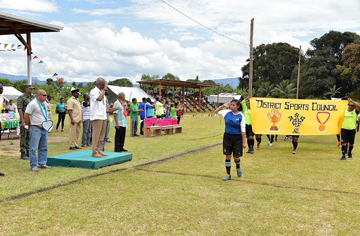 President David Granger receives the March Past at the launch of the Upper Mazaruni 21st Annual District Games in Waramadong. (DPI Photo) 