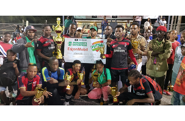 Principals of New Era Entertainment making the presentation to the victorious Figgy Green Jaguars at the conclusion of the Mohamed’s Enterprise/ExxonMobil, New Era Entertainment final. (Rawle Toney photo)