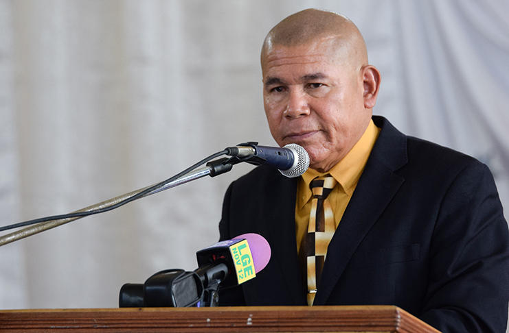 Minister of Social Cohesion, Dr. George Norton giving his address at the graduation of the Youth Empowerment Agro-Processing Programme. (Jameel Mohamed photo)