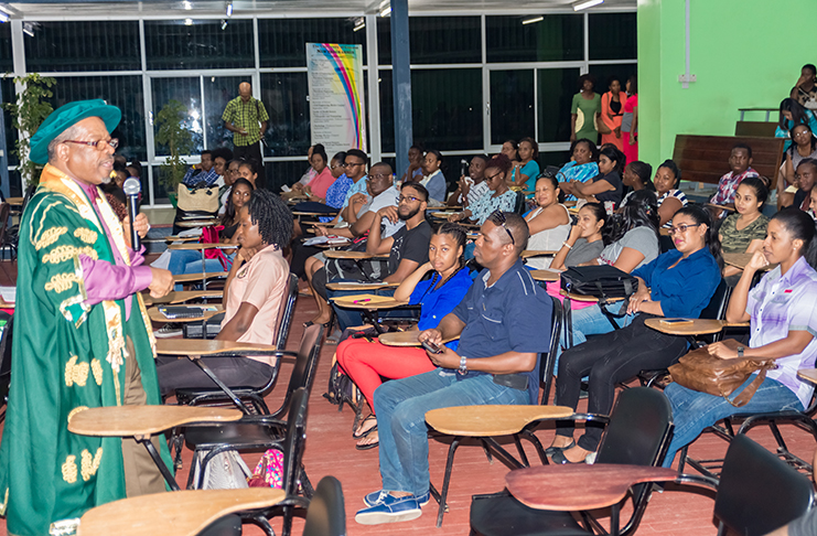 Vice Chancellor and Principal of UG, Professor Ivelaw Griffith, having a brief chat and sharing advice with students during the orientation.