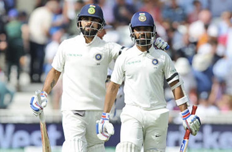 Virat Kohli (left) and Ajinkya Rahane's century stand guided India to 307/6 on day 1. (Reuters)