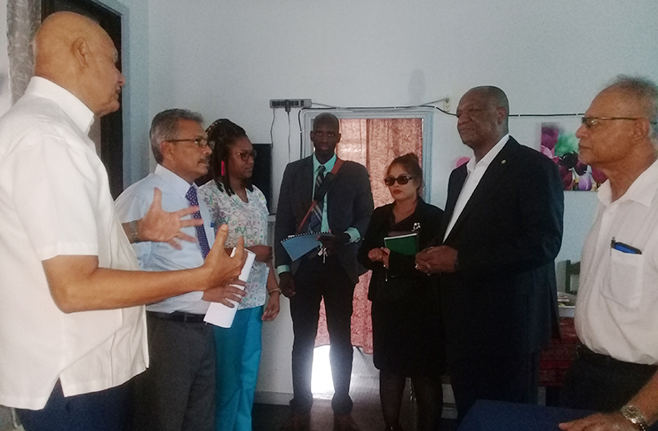 Minister of State, Joseph Harmon and staff interacting with the officials of Beacon Foundation