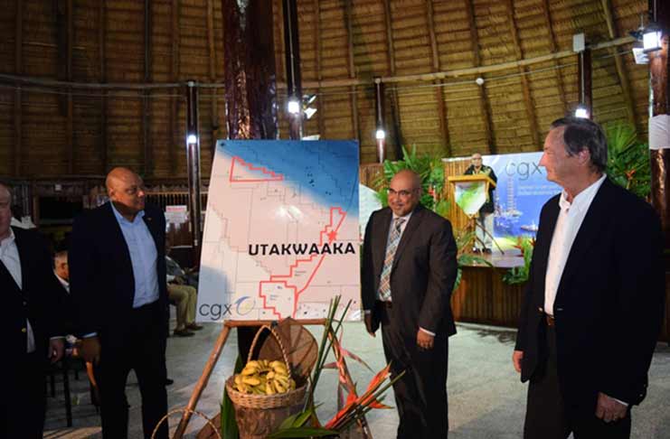 Natural Resources Minister Raphael Trotman and CGX Executive Chairman, Professor Suresh Narine after  unveiling  the name of the well (DPI photo)