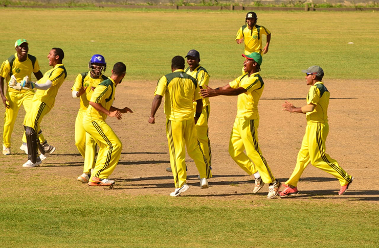 Ricardo Adams and Essequibo players celebrate his hat-trick (Adrine Narine photos)