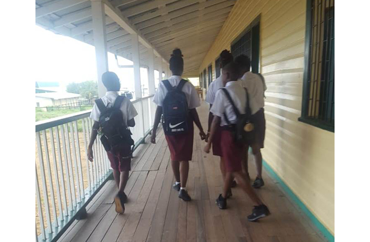 Students at the Cotton Field Secondary at school on Monday.