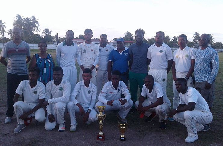 The victorious Young Warriors cricket team pose with officials of the BCB and Sueria Manufacturing.