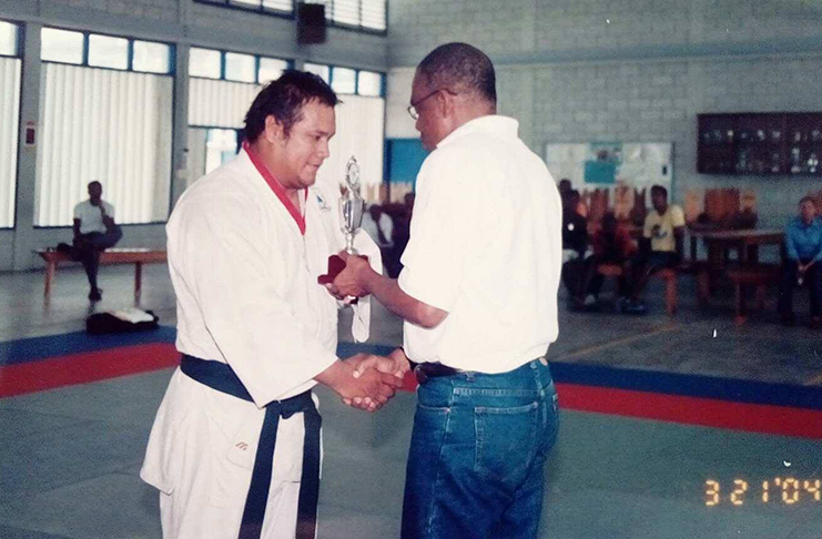 Flashback: John Yong collecting his second place trophy in the heavyweight division of the 2004 national championships.
