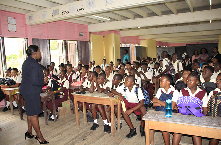 Minister of Education, Nicolette Henry addressing students in Berbice