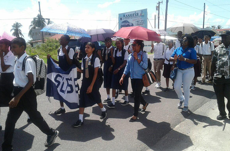 Students and stakeholders braved the heat during the child-protection march