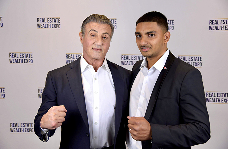 Raymond Harlall shares a moment with Hollywood Actor Sylvester Stallone, at an event
