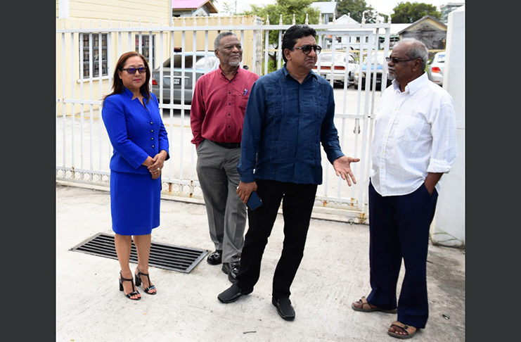 Former government officials outside the offices of SOCU on Wednesday. From left is Opposition MP Pauline Sukhai, Former Prime Minister Samuel Hinds, Opposition MP Anil Nandalall who appeared as an attorney and former Minister of Local Government , Kellawan Lall. (Samuel Maughn photo)
