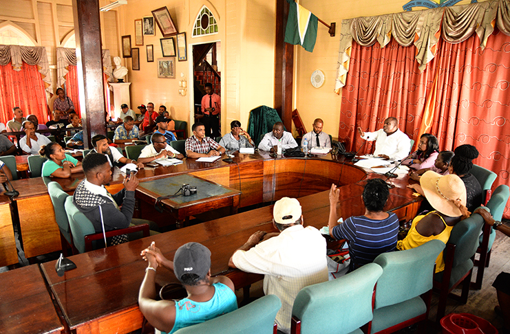 Town Clerk, Royston King meeting with vendors