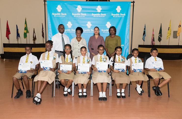 Students of Queen’s College in receipt of Republic Bank’s RightStart Gift Certificate and a special gift on Friday