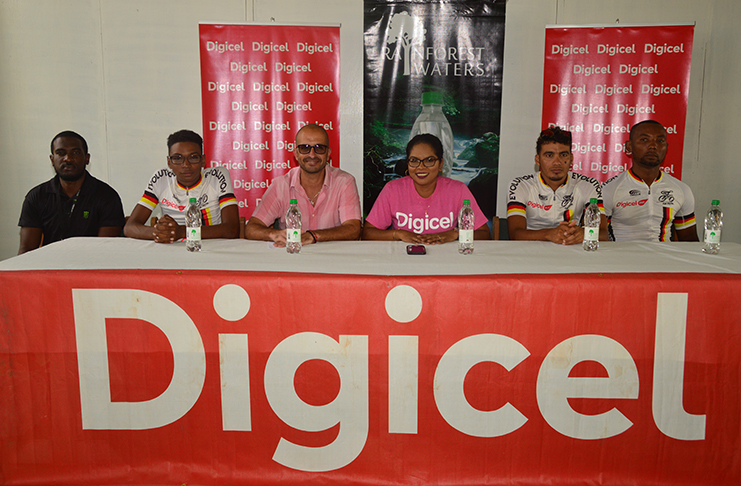 Keith Fernandes of Evolution Cycle Club, Digicel’s Vidya Sanichara, along with Banks DIH representative and members of Evolution Cycle Club at the launch of the Digicel/Team Evolution Cancer Awareness Cycle. (Adrian Narine photo)