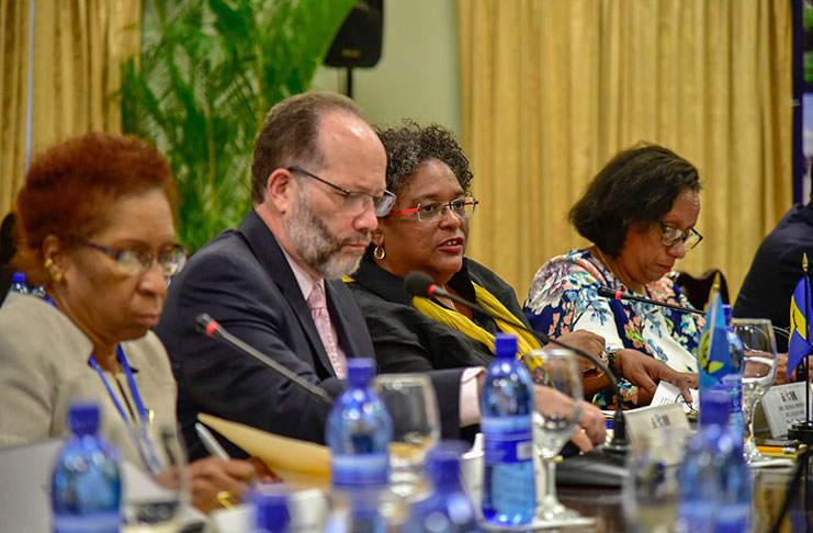 CARICOM Secretary-General Ambassador Irwin LaRocque (2nd left) and Prime Minister Mia Mottley of Barbados (3rd left) at a meeting on the CSME in Haiti on Tuesday