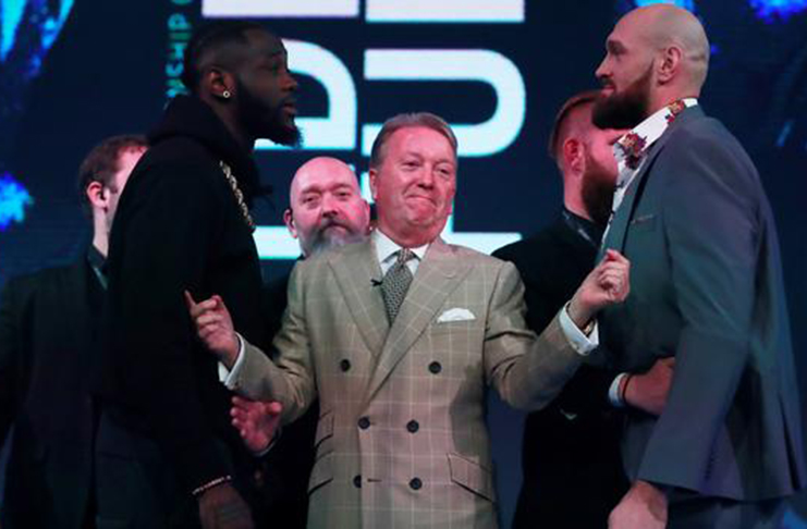 Deontay Wilder (left) and Tyson Fury face off in London on Monday at a news conference in London, Monday.
