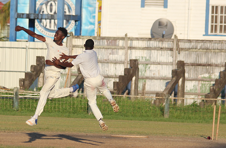 Delon Dalrymple (right) celebrates after taking the last wicket of the match.