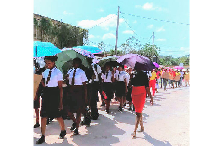 Students of Kwakwani Primary and Secondary Schools as they participate in the ‘Break the Silence’ Rally held in Kwakwani on Thursday