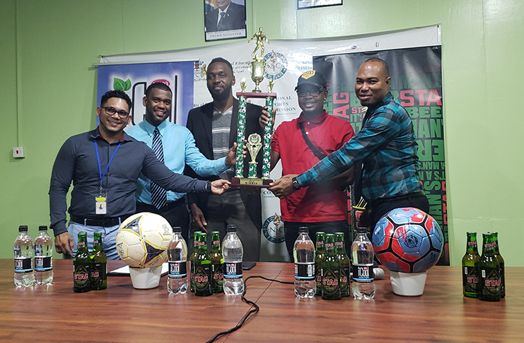 From left are Brand Coordinator Fharis Mohamed, Errol Nelson, head of Ansa McAl business unit, Director of Sport Christopher Jones, Organiser Marlon Jacobs, and STAG Beer Brand Manager Nigel Worrell.