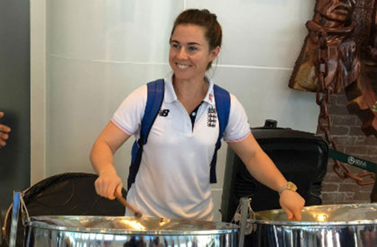 England star Tammy Beaumont tries her hand at the steel pan following her arrival for the Women’s Twenty20 World Cup.