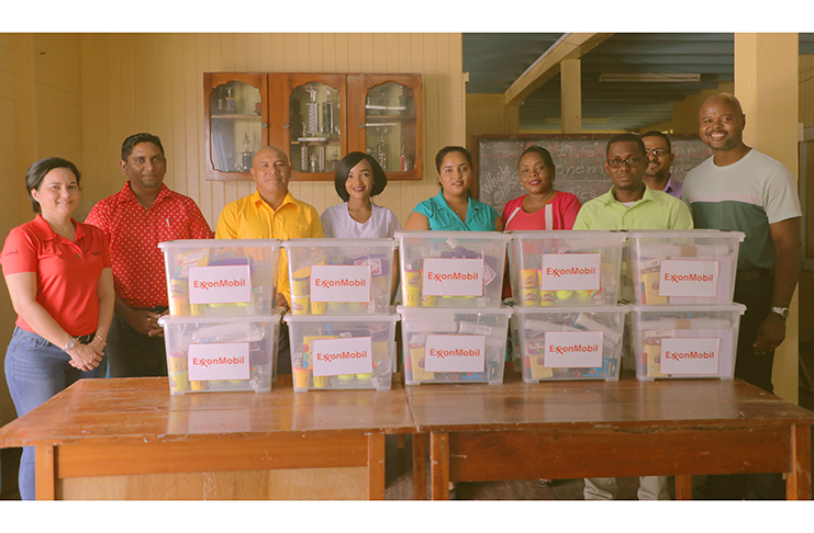 Youth Challenge Guyana Executive Director, Dimitri Nicholson (extreme right) presenting the teachers of Mashabo, Mainstay Lake, Bethany, Capoey Lake, and Hackney Primary Schools in Region Two with the Inquiry-Based Science Kits