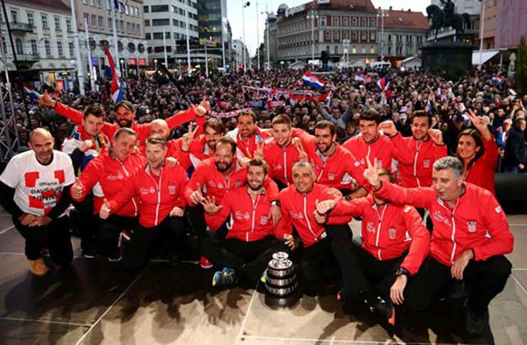 Croatia team captain Zeljko Kraja and team celebrate winning the Davis Cup November 26, 2018. (REUTERS/Antonio Bronic)