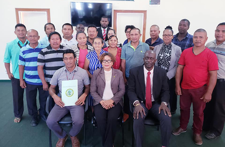 Members of the NTC pose with Minister within the Ministry of Indigenous Peoples’ Affairs, Valerie Garrido-Lowe; GLSC Commissioner Trevor Benn and NTC Chairman Nicholas Fredricks