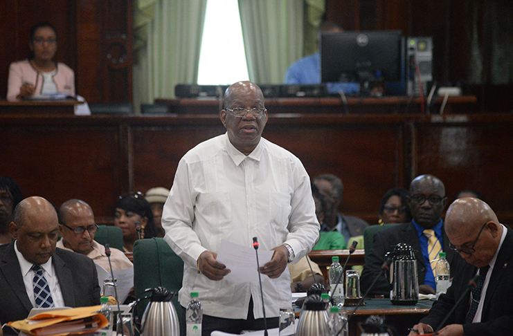 Minister of Finance Winston Jordan presents the current and capital estimates of the constitutional agencies in parliament on Monday (Delano Williams photo)