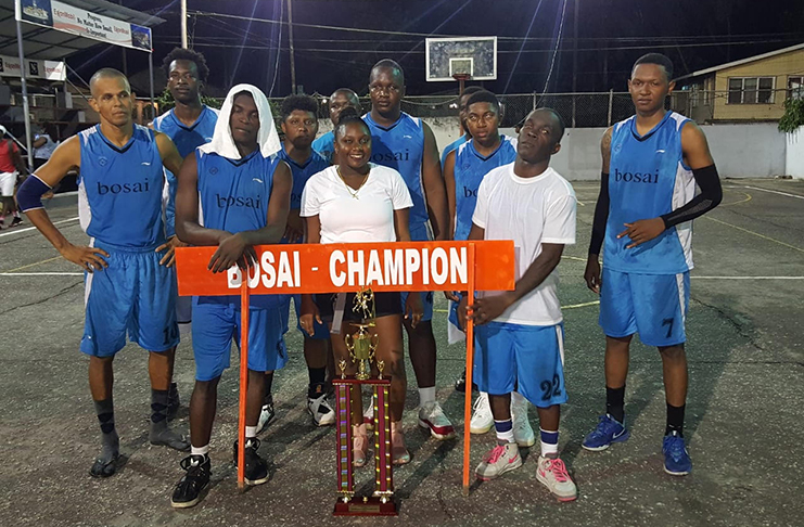 The 2018 Bosai Basketball Champions General Services pose. At right is Most Valuable Player Terron Welch.