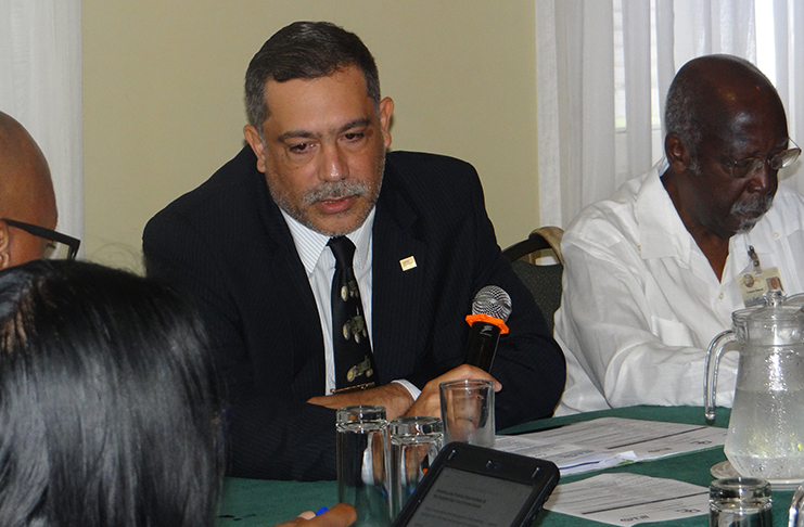 Wilmot Garnett, IICA Representative in Guyana making a point. He is seated next to Clement Duncan, Chairman, Guyana Manufacturing and Services Association (GMSA)